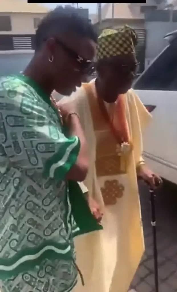 Rare video Of Wizkid holding his aged father melts hearts
